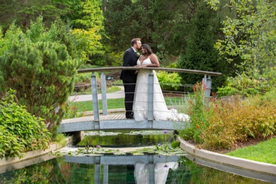 bride and groom in Burlington garden